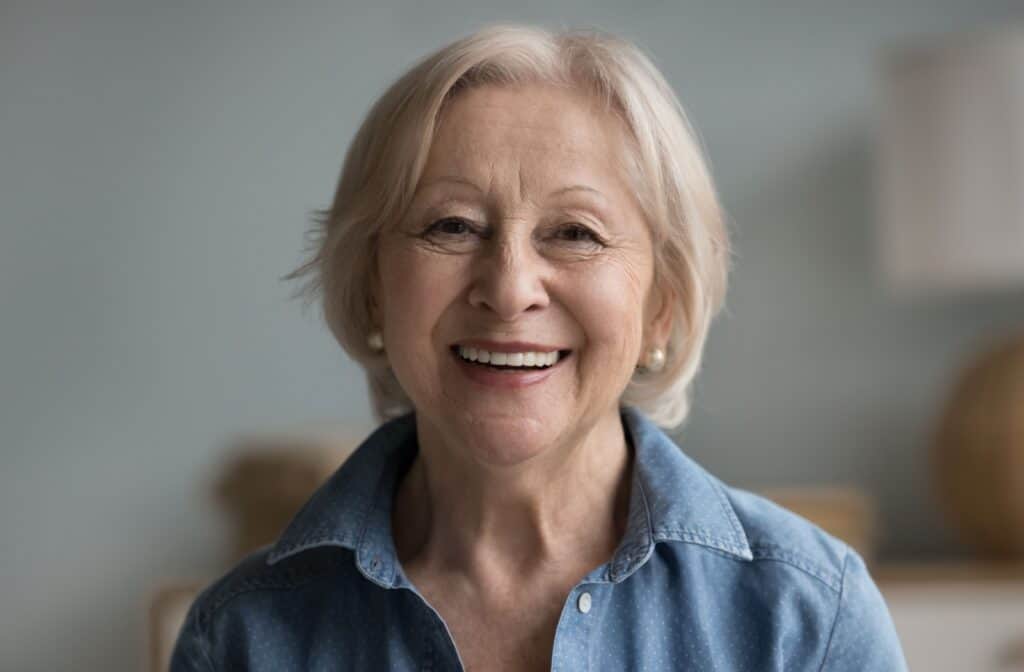 Senior woman wearing dentures.