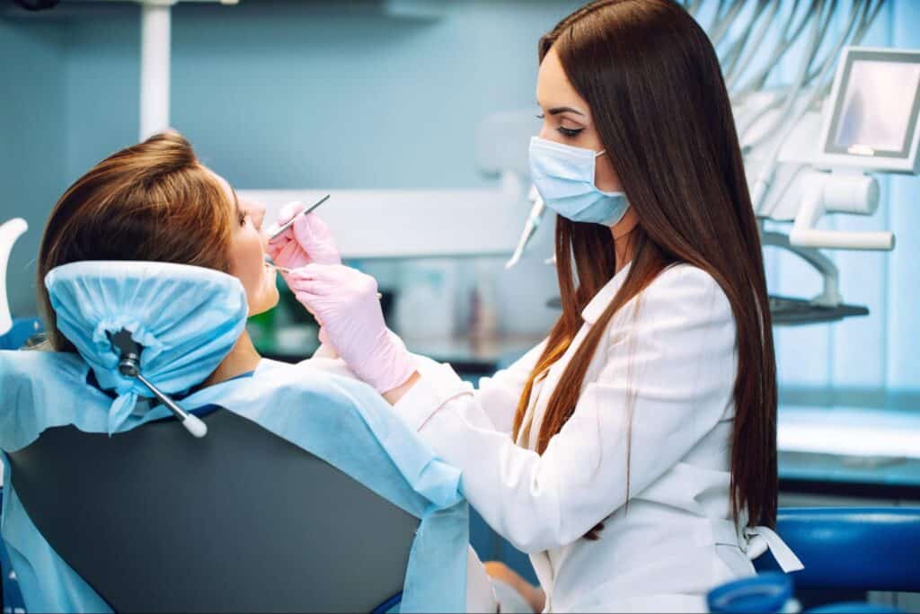 Young woman at the dentist during a dental procedure